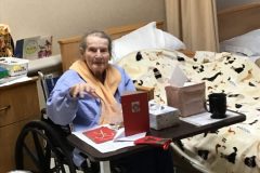 E.-Berg-waving-to-Santa-scaled